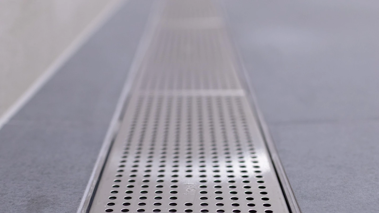 Newly renovated Wembley Stadium shower rooms, featuring frost linear drainage for improved design.