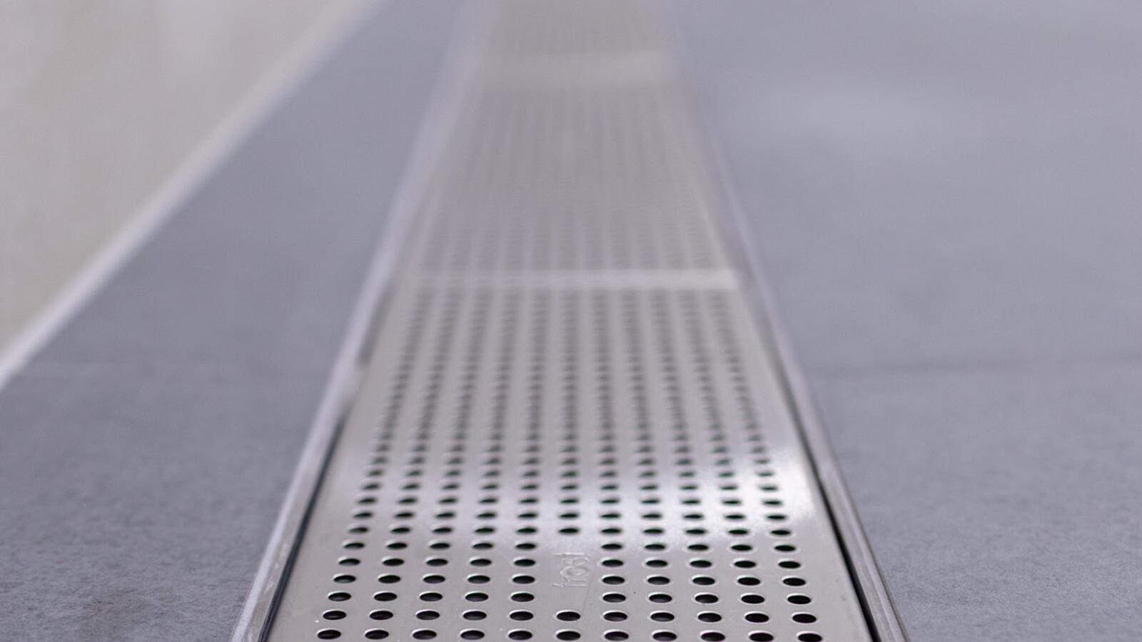 Newly renovated Wembley Stadium shower rooms, featuring frost linear drainage for improved design.