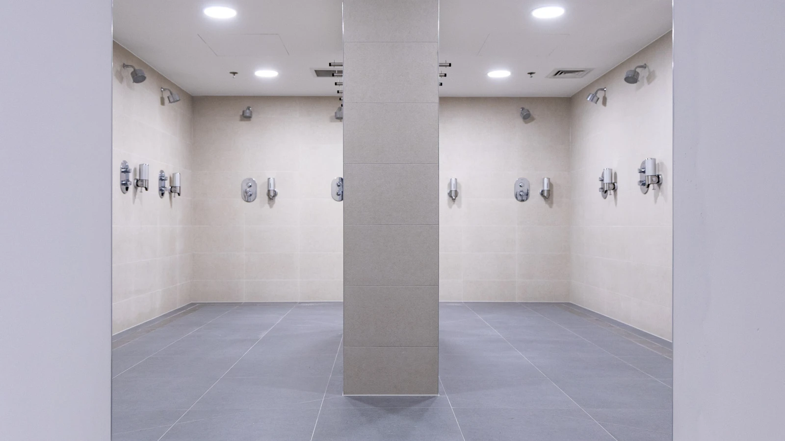 Modernized Wembley Stadium shower rooms featuring newly installed frost linear drainage.