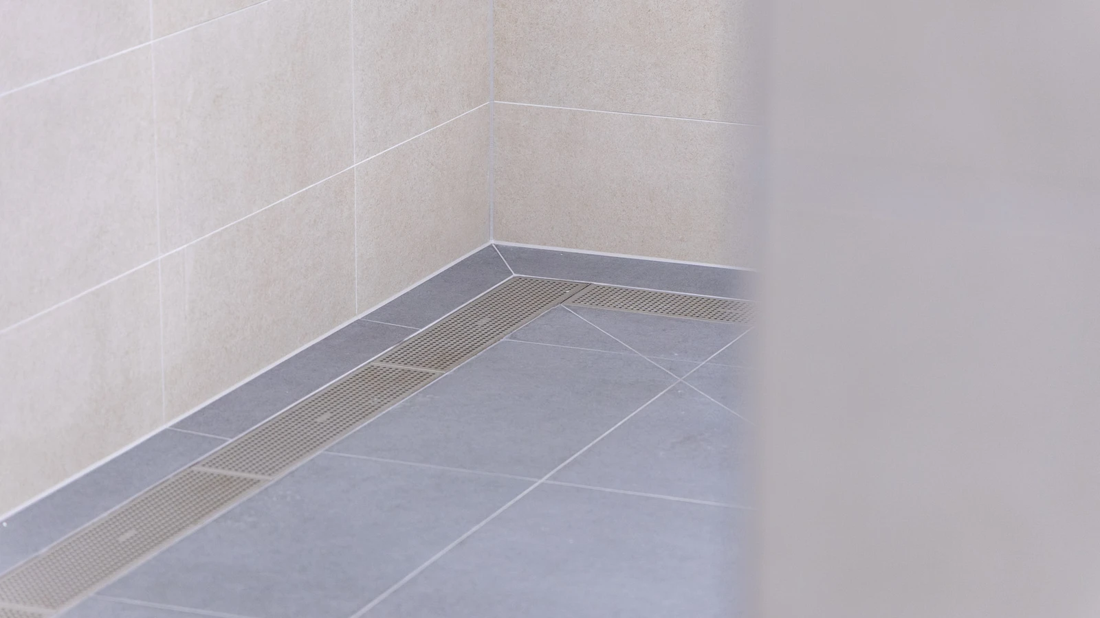 Wembley Stadium’s upgraded shower rooms with sleek frost linear drainage installed.