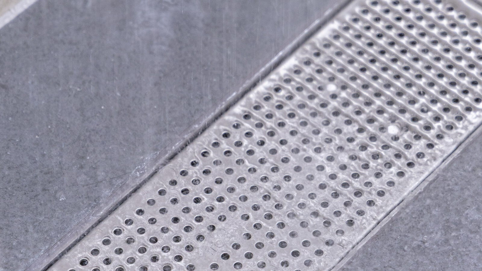 Enhanced shower areas at Wembley Stadium, now with frost linear drainage upgrades.