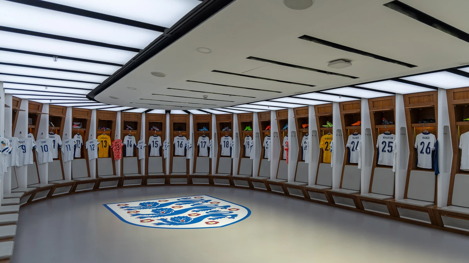 Wembley Stadium changing room with England football team shirts