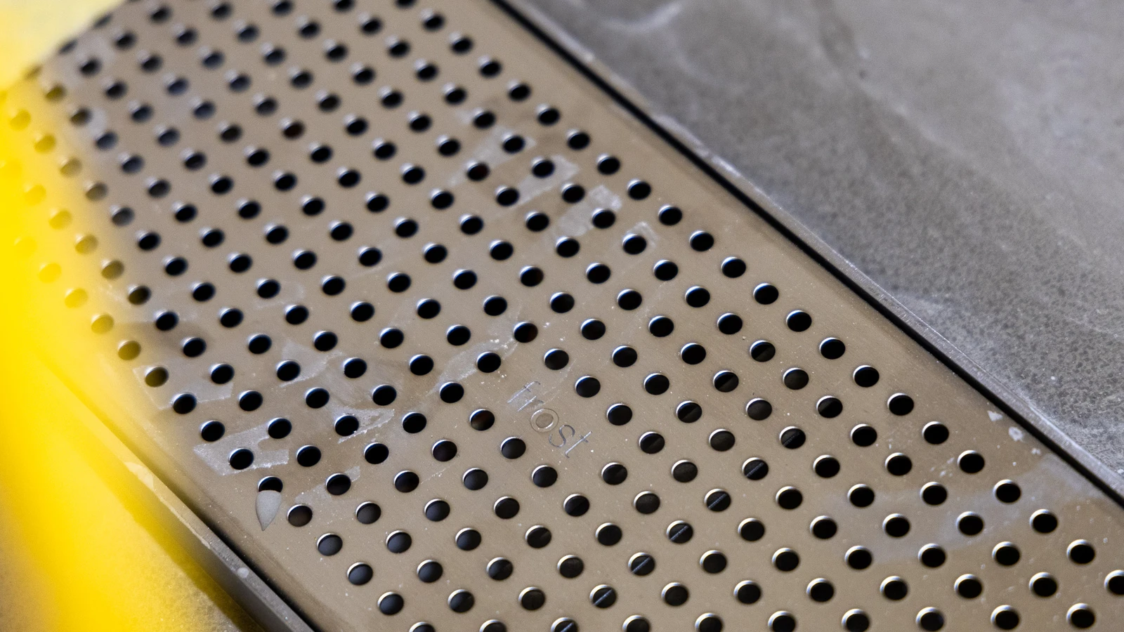 Close-up of Frost linear drainage being installed at Wembley Stadium.
