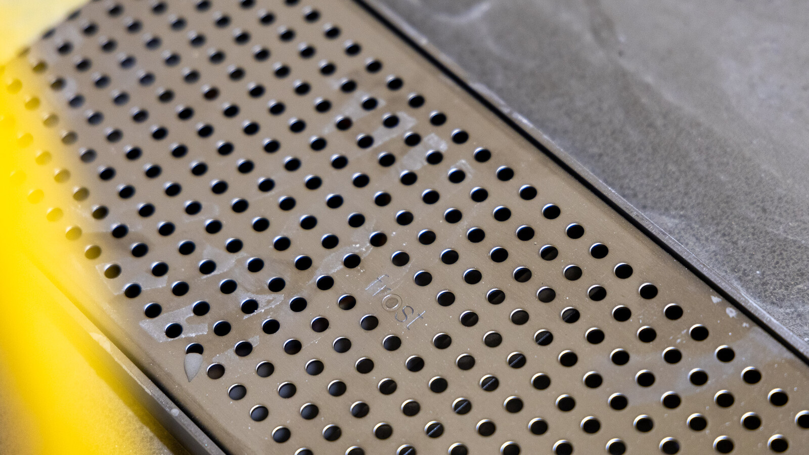 Close-up of Frost linear drainage being installed at Wembley Stadium.
